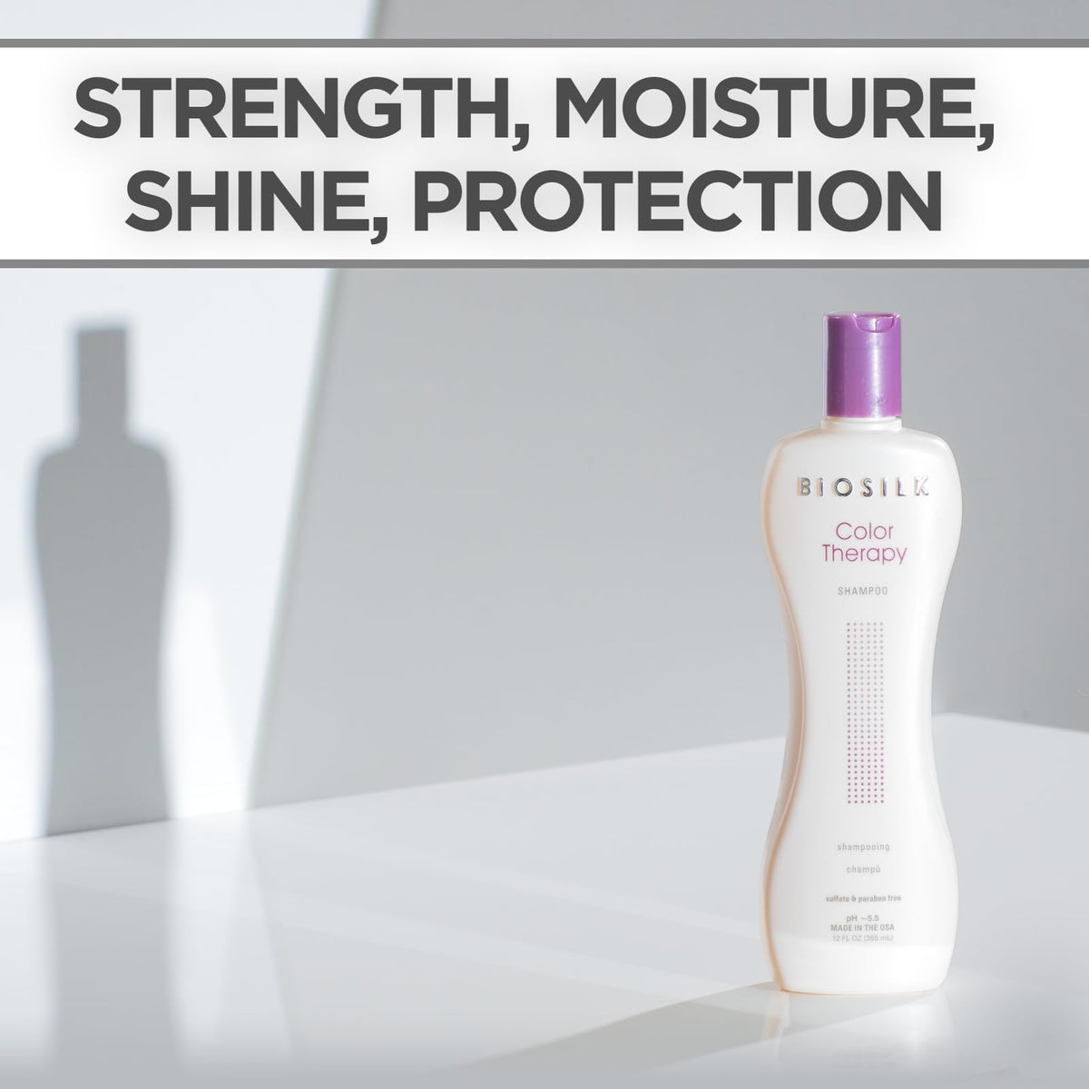 Hand holding BioSilk bottle showing 12 oz scale and travel-friendly benefit
