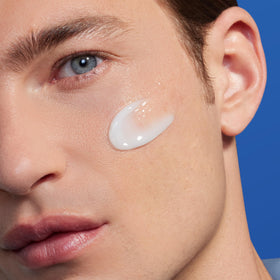 Biotherm cream on hand demonstrating lightweight spreadability and absorption