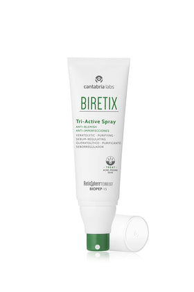 Biretix Tri-Active Spray being applied to shoulder showcasing quick absorption