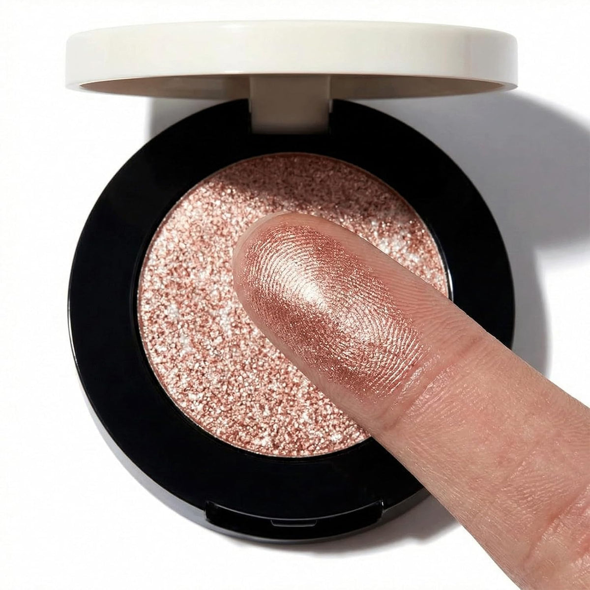 BITYEYE metallic swatches on forearm showing buildable color payoff