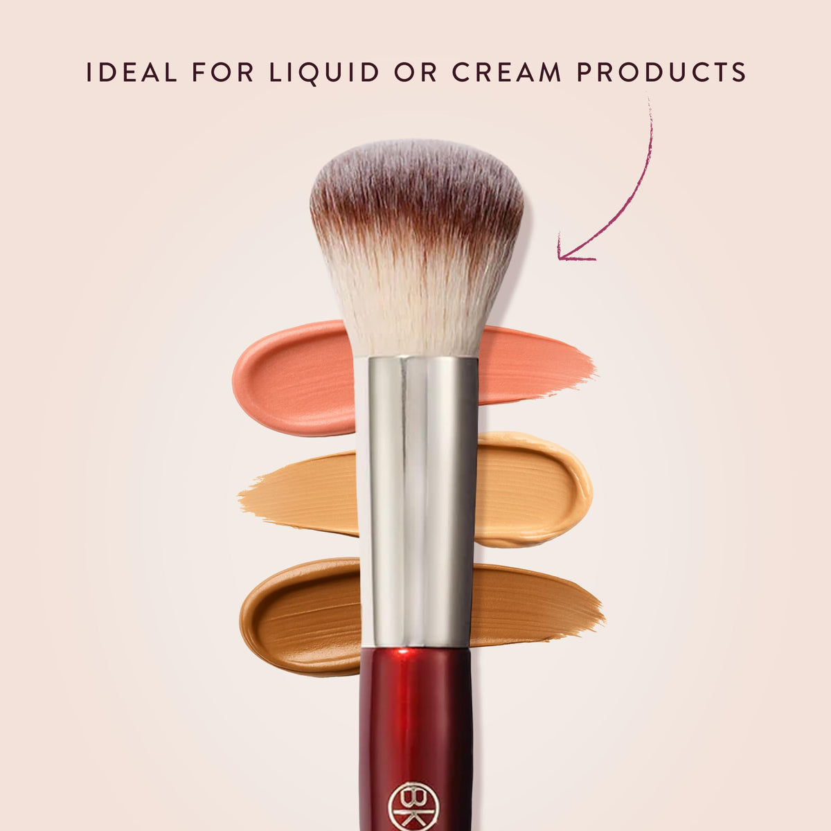 BK BEAUTY brush held in hand to show size and ergonomic benefit