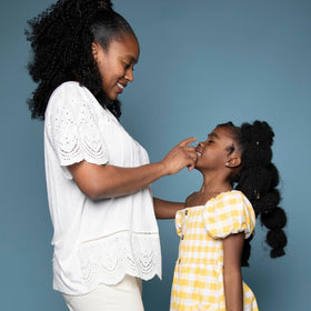 Black Girl Sunscreen ingredient highlights showing shea butter and jojoba benefits