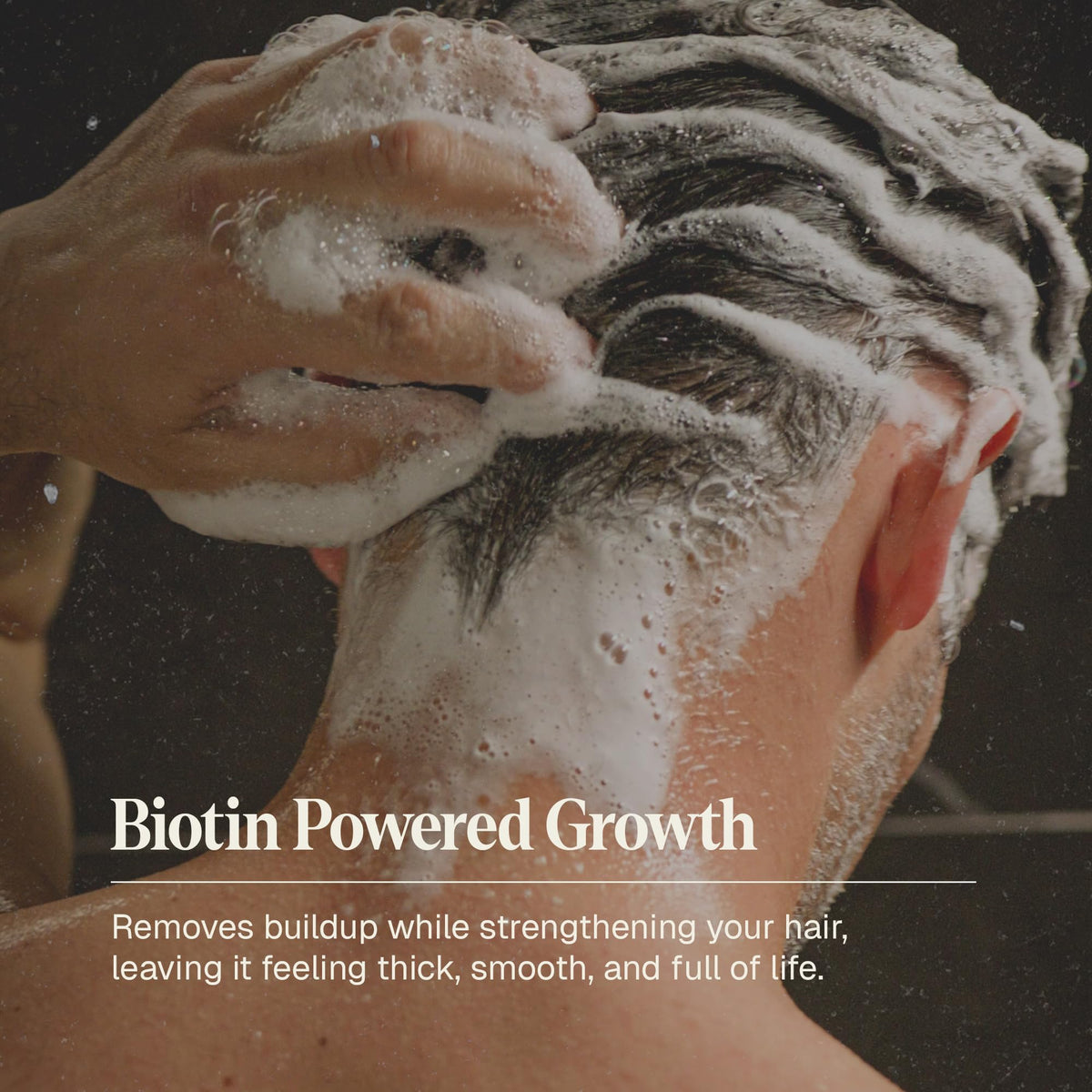 Black Wolf shampoo being applied in hand showing easy distribution and lift