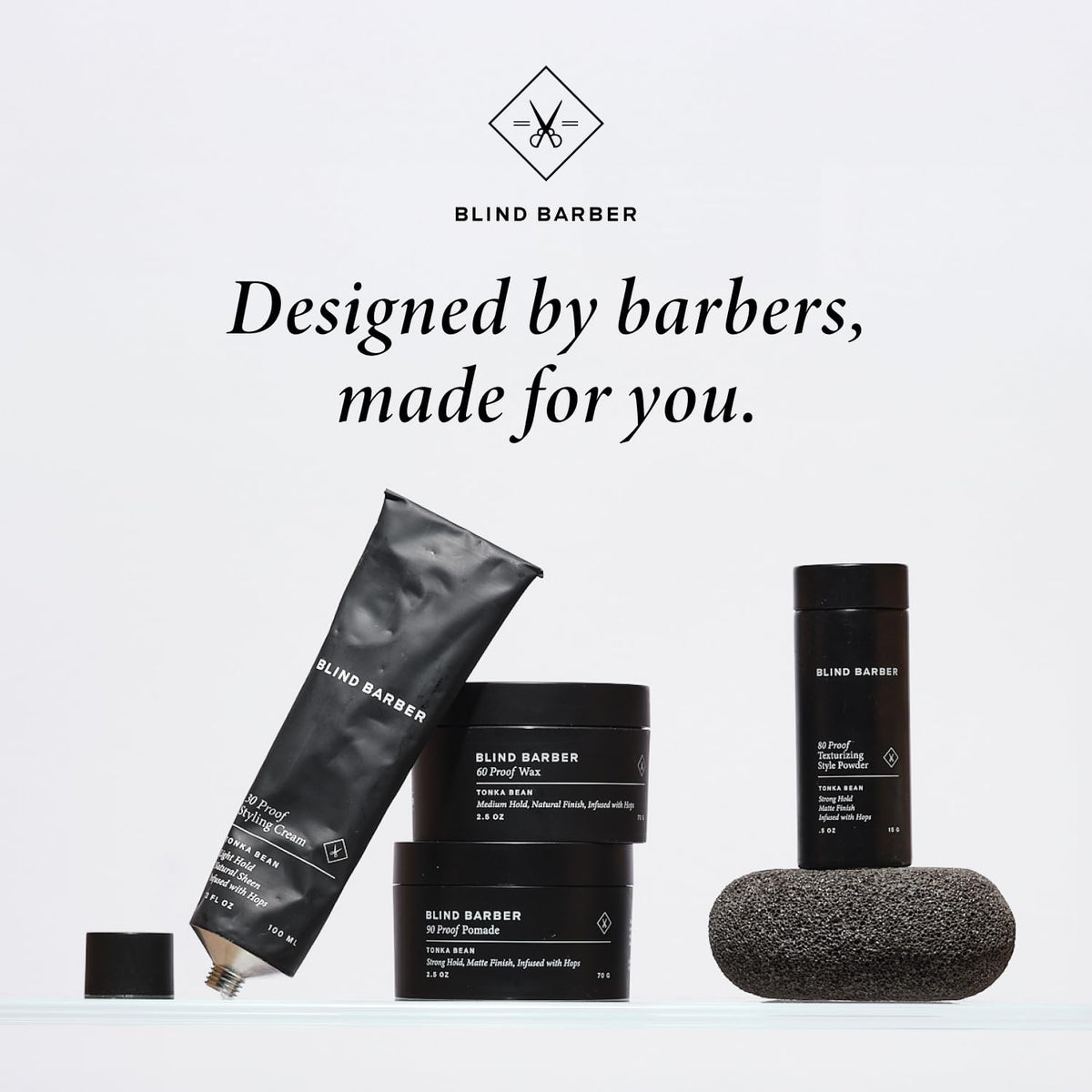 Blind Barber bottle beside razor for scale, emphasizes large barbershop-sized volume