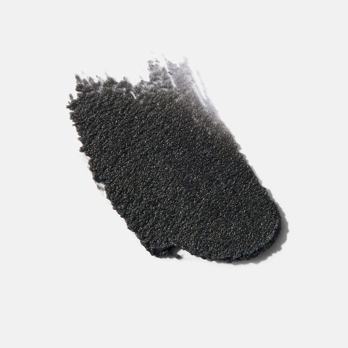 Blind Barber texture close-up with quartz powder revealing gentle exfoliation benefit