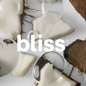 Bliss cream spread on forearm showing silky finish and illuminating glow