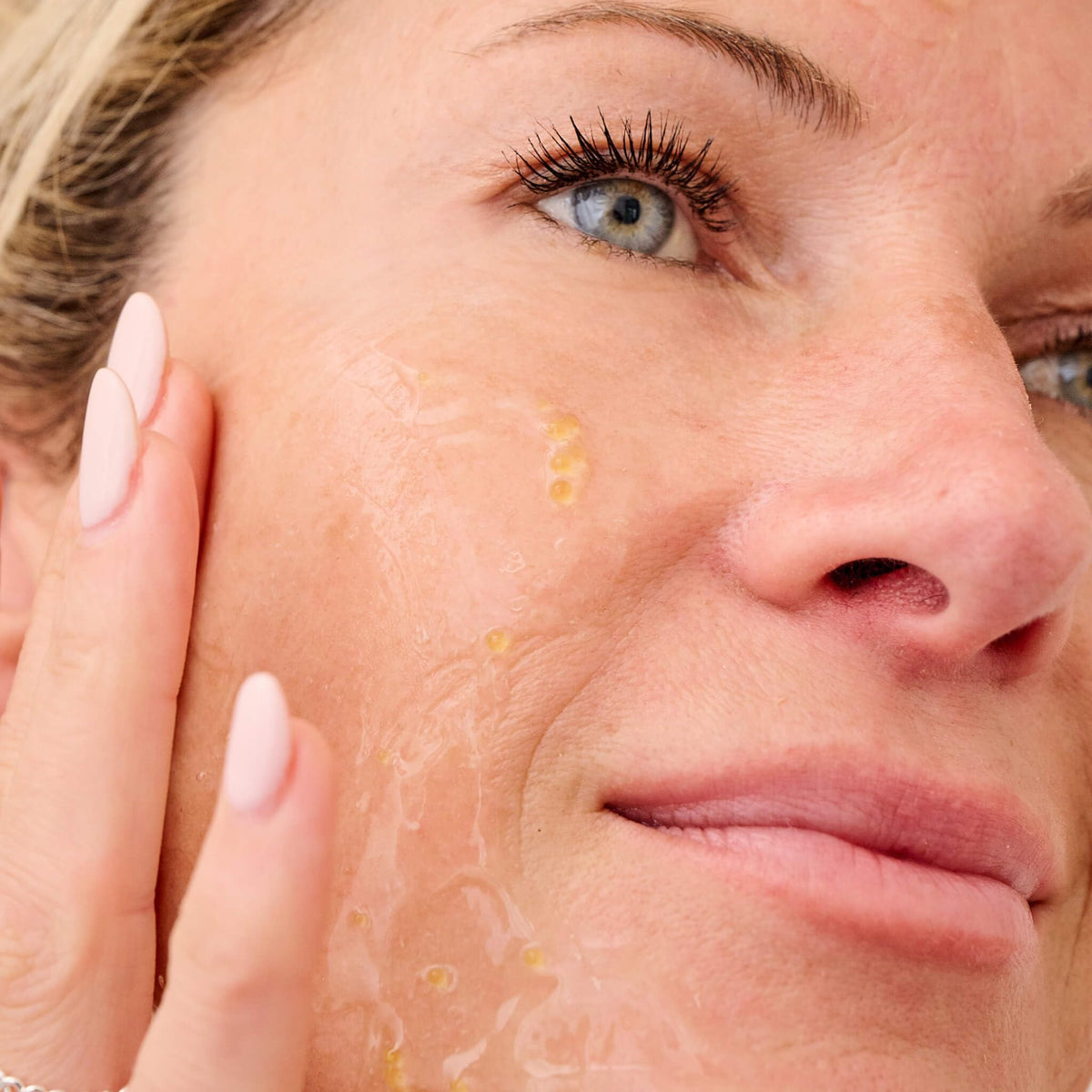 Bliss mask on bedside counter in nighttime routine showing dewy morning benefit