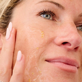 Bliss mask on bedside counter in nighttime routine showing dewy morning benefit