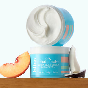 Bliss label close-up showing ingredient highlights like coconut and shea for nourishment