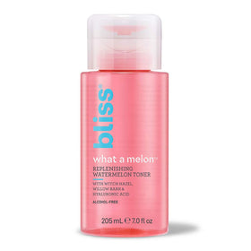 Bliss bottle held in hand for scale and travel-friendly size benefit