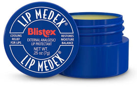 Blistex Lip Medex close-up texture on fingertip showing smooth emollient benefit