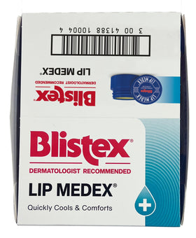 Blistex beside a coin for scale showing compact 0.25 ounce portability