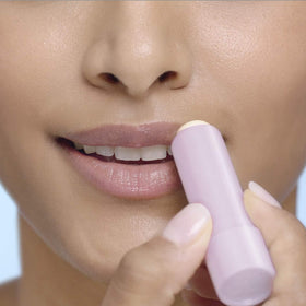 Lifestyle scene with Blistex three-pack in a bag for convenient on-the-go lip care