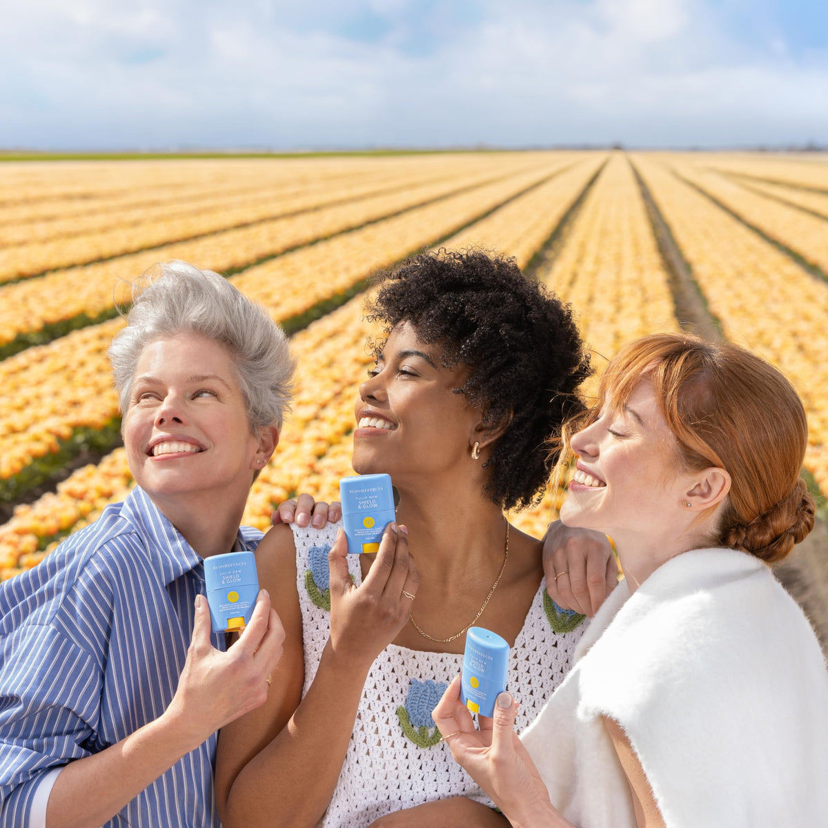 Bloomeffects applying sunstick outdoors to face showing quick on-the-go protection