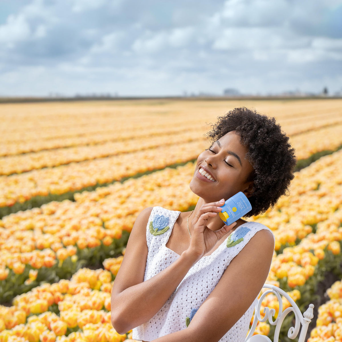 Bloomeffects sunstick in hand highlighting travel-size convenience and portability