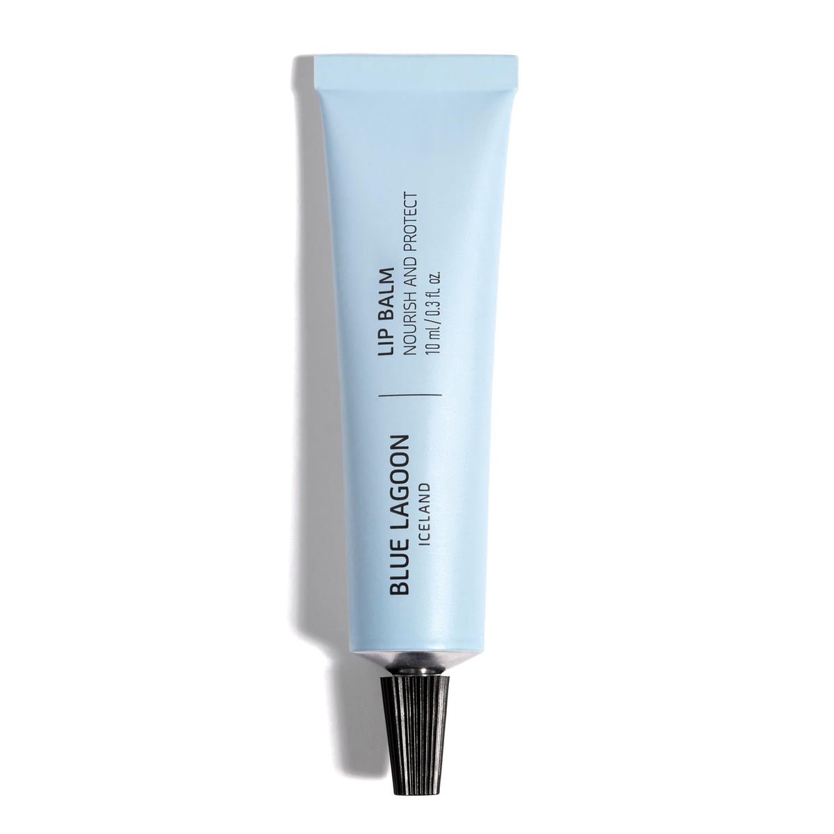 Blue Lagoon lip balm front packaging showing label and peppermint scent benefit