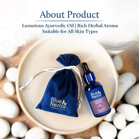 Blue Nectar bottle beside nighttime skincare items suggesting ritual use