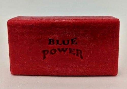 BluePower bar next to a travel toiletry for compact, portable cleaning