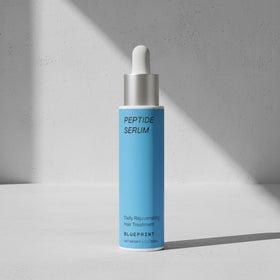 Blueprint Bryan Johnson dropper applying serum to scalp for targeted delivery benefit