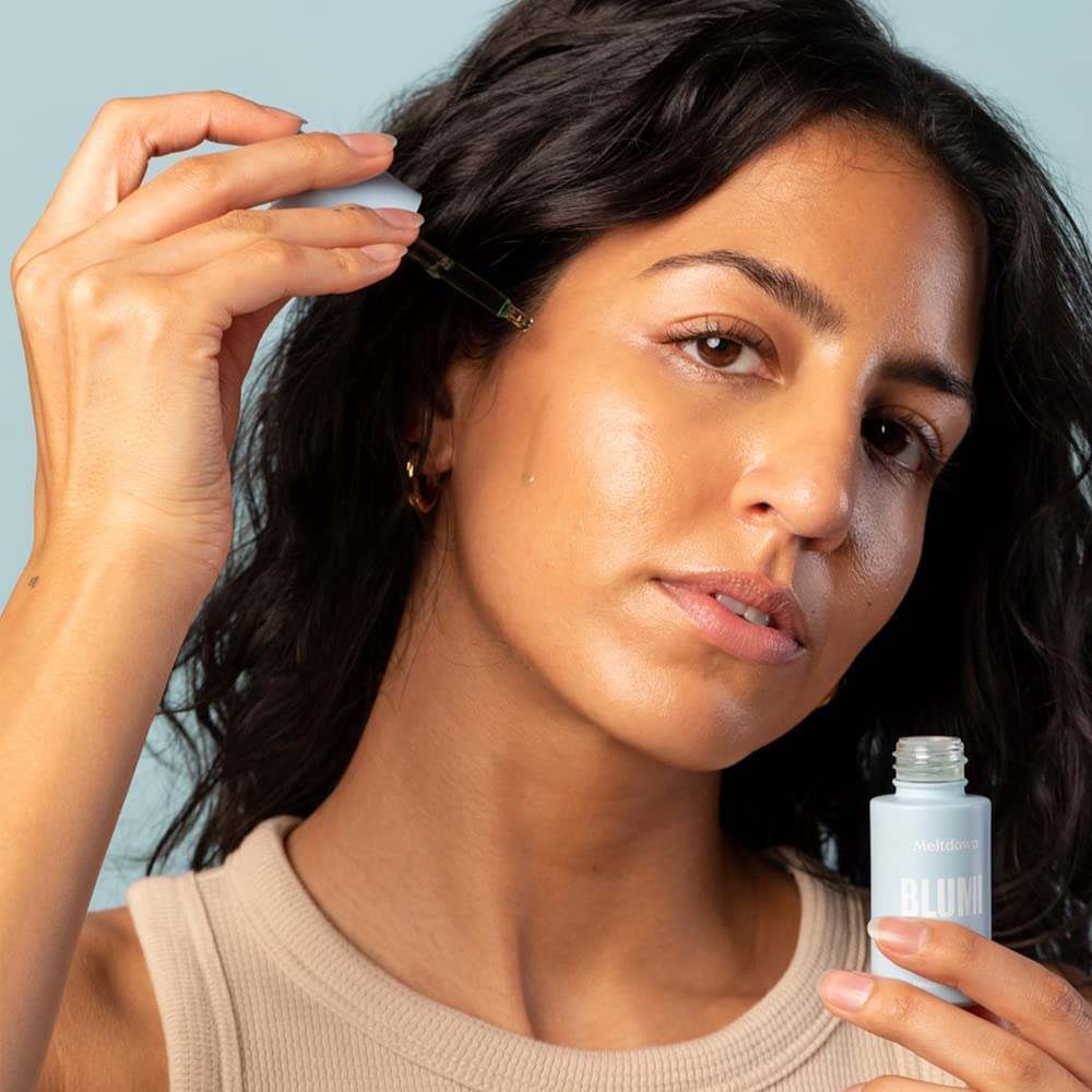 Blume Meltdown close-up dropper dispensing oil for precise application