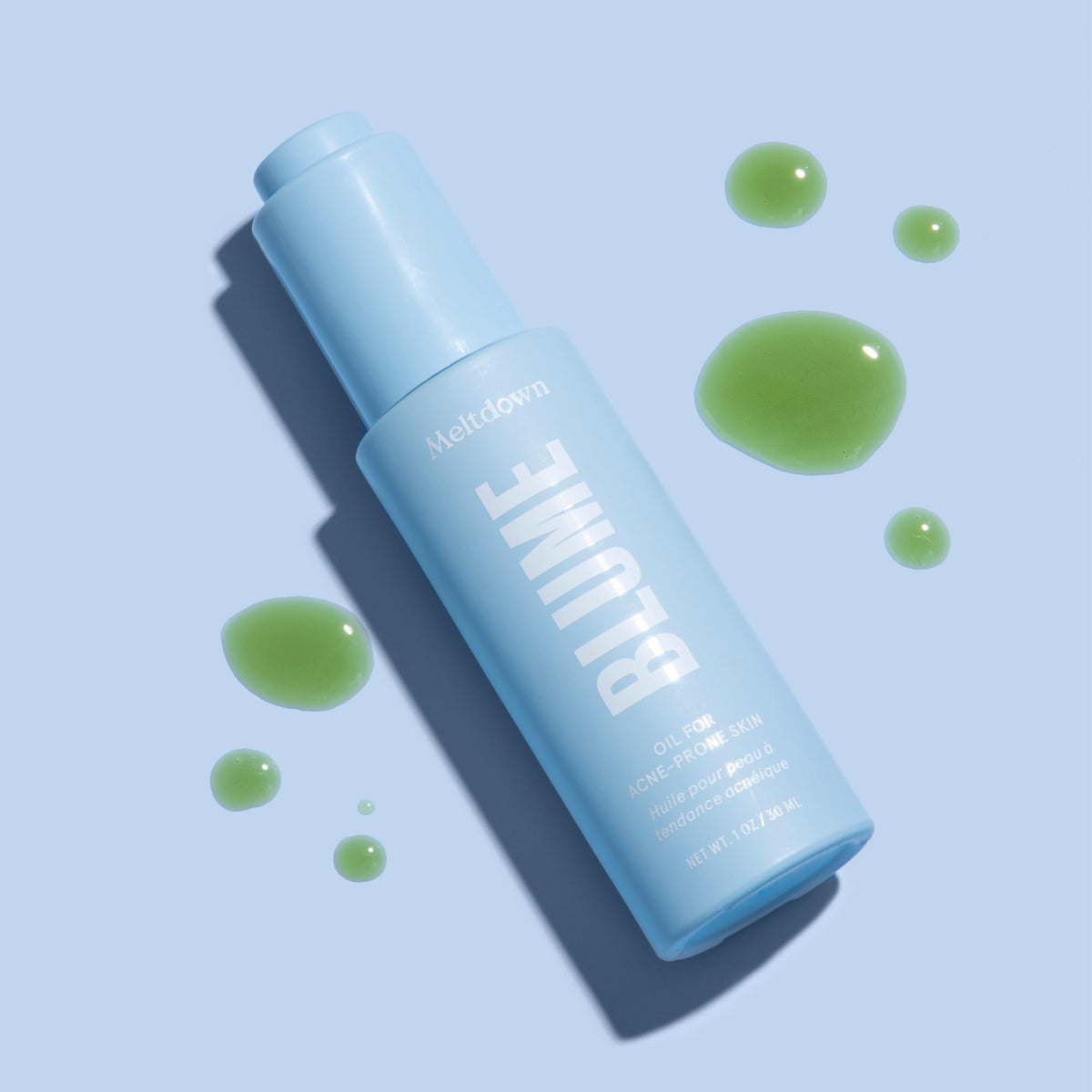 Blume Meltdown held in hand to show scale and one-pump usage