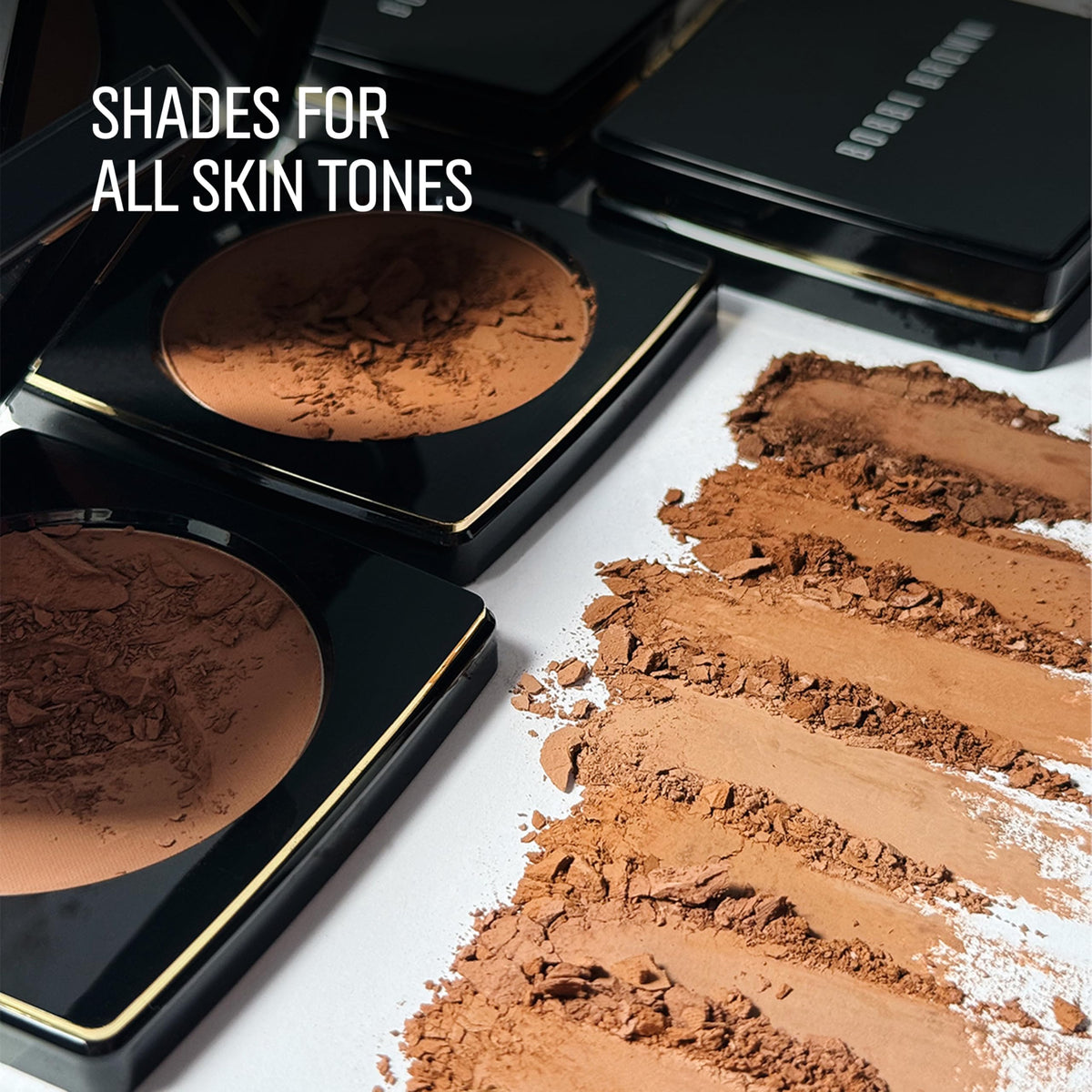 Bobbi Brown bronzing powder next to coin for size and travel-friendly convenience