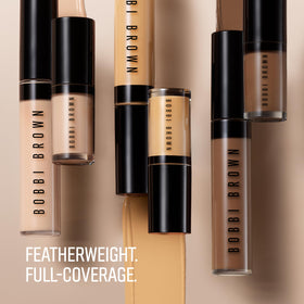Bobbi Brown concealer being applied under eye demonstrating smooth blending benefit
