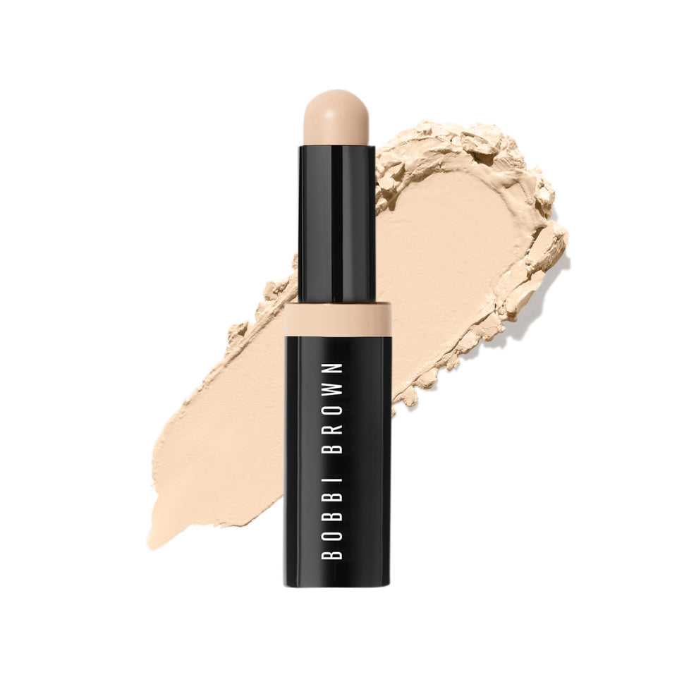 Bobbi Brown concealer stick front view showing ivory shade and compact packaging benefit