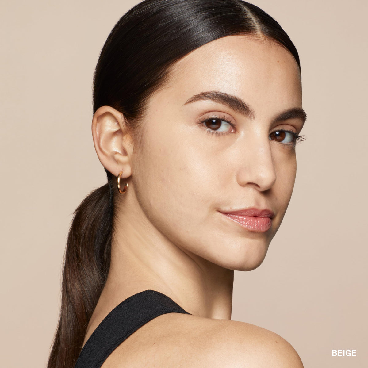 Bobbi Brown concealer stick ingredients and label close-up indicating formulation transparency and benefits