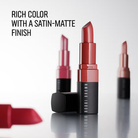 Bobbi Brown crushed lip color on model smile showing Bare shade natural look and comfortable wear
