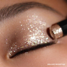 Bobbi Brown in a makeup pouch lifestyle shot for effortless on-the-go glow
