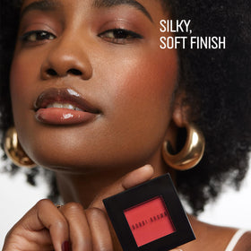 Bobbi Brown swatch on skin showing Desert Pink blendability benefit