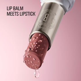 Bobbi Brown close-up of model lips wearing Nude Mauve showing plumping effect and luminous color