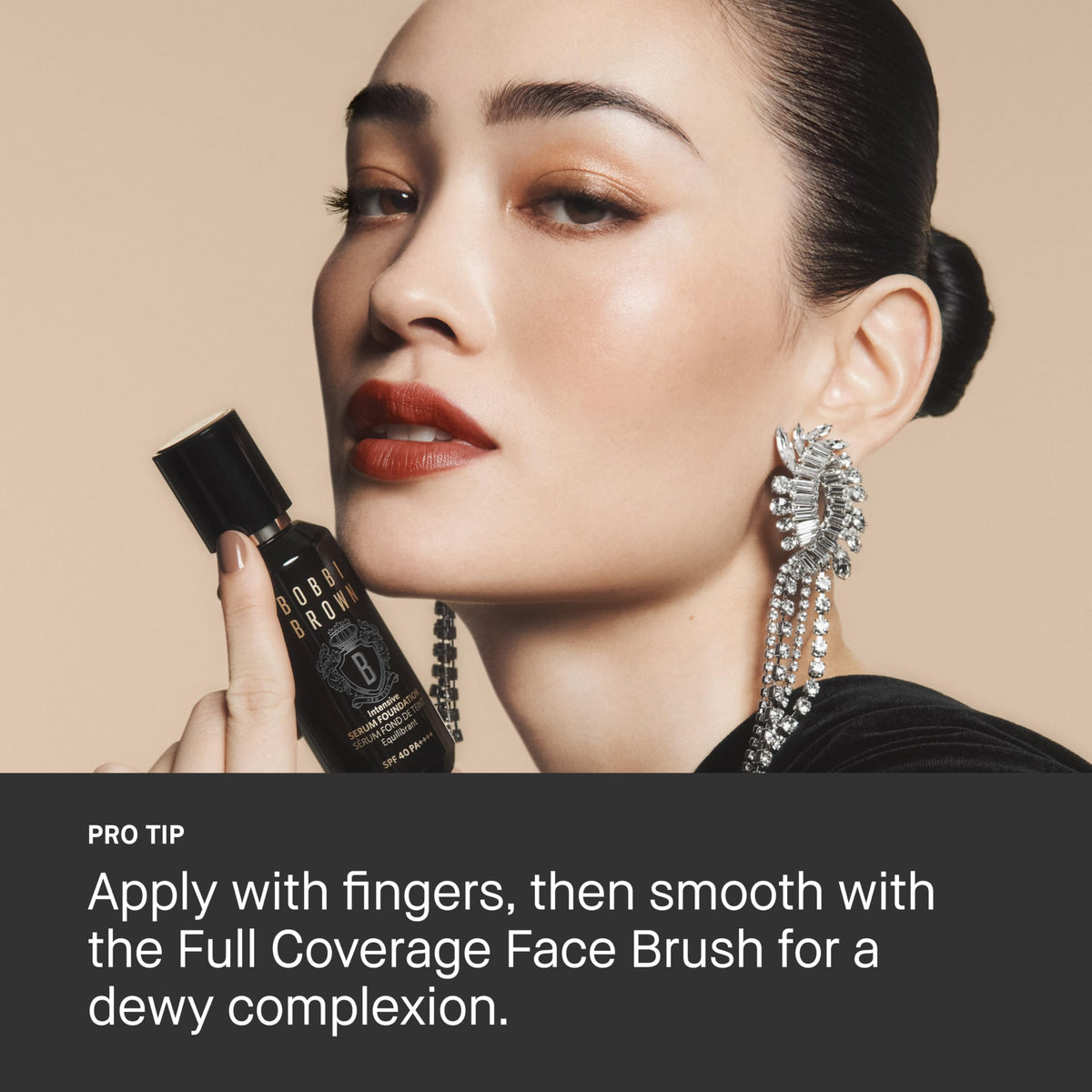 Bobbi Brown foundation applied by brush on face illustrating radiant, even coverage