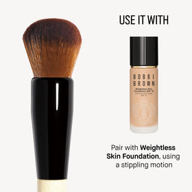 Bobbi Brown brush packaging and label visible, highlighting brand quality and care