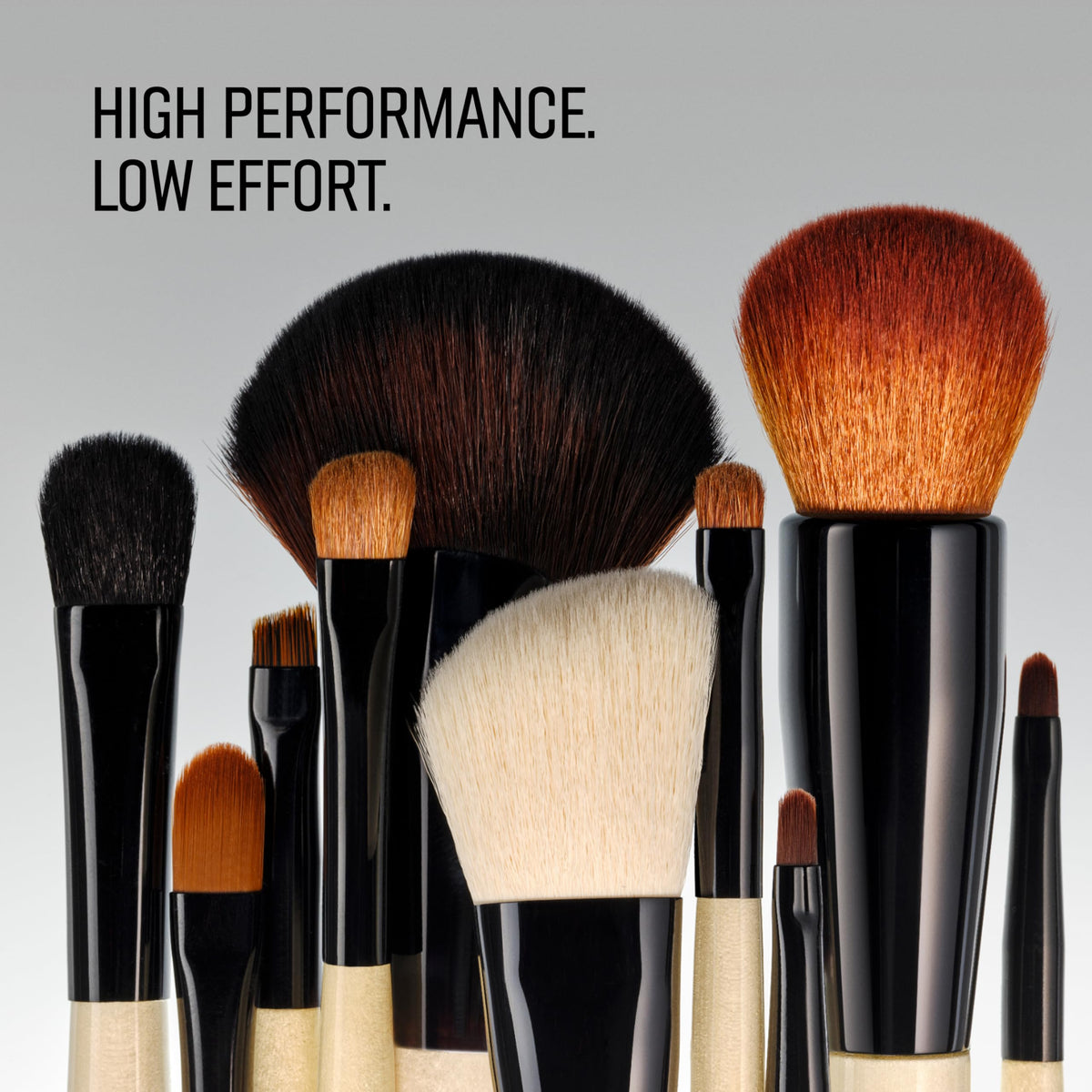 Bobbi Brown brush held in hand to show compact size and control for detailed work