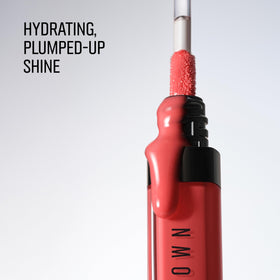 Bobbi Brown model wearing gloss demonstrating luminous, non-sticky shine