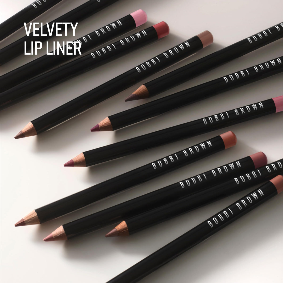 Bobbi Brown lip pencil used under gloss to enhance shine and wear