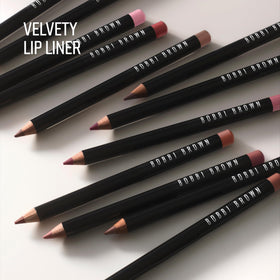 Bobbi Brown lip pencil used under gloss to enhance shine and wear