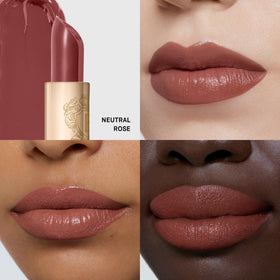 Bobbi Brown luxe lipstick bullet tilted to show neutral rose color payoff