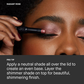 Bobbi Brown shadow stick beside makeup bag showing size and on-the-go portability