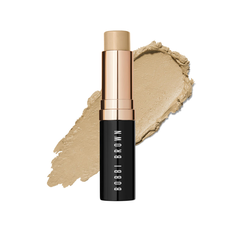 Bobbi Brown front view of foundation stick showing warm ivory shade and portable packaging benefit