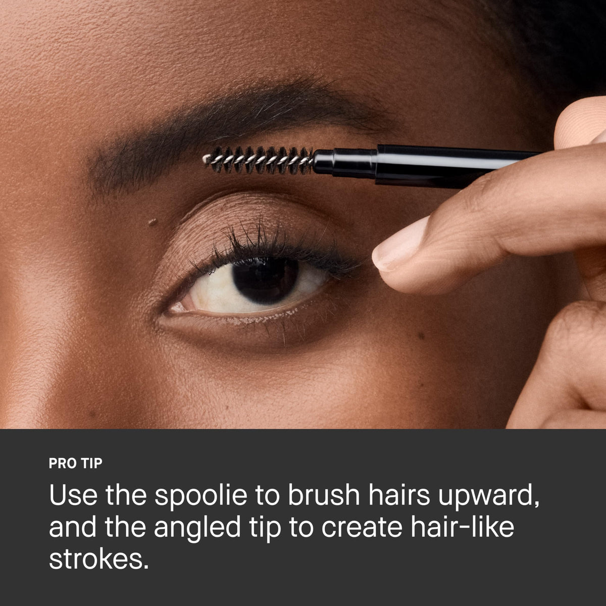 Bobbi Brown precise brow pencil on vanity next to mirror for everyday routine
