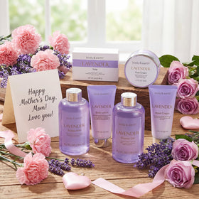 BODY & EARTH full gift set styled in a bathroom scene promoting relaxing at-home spa benefit