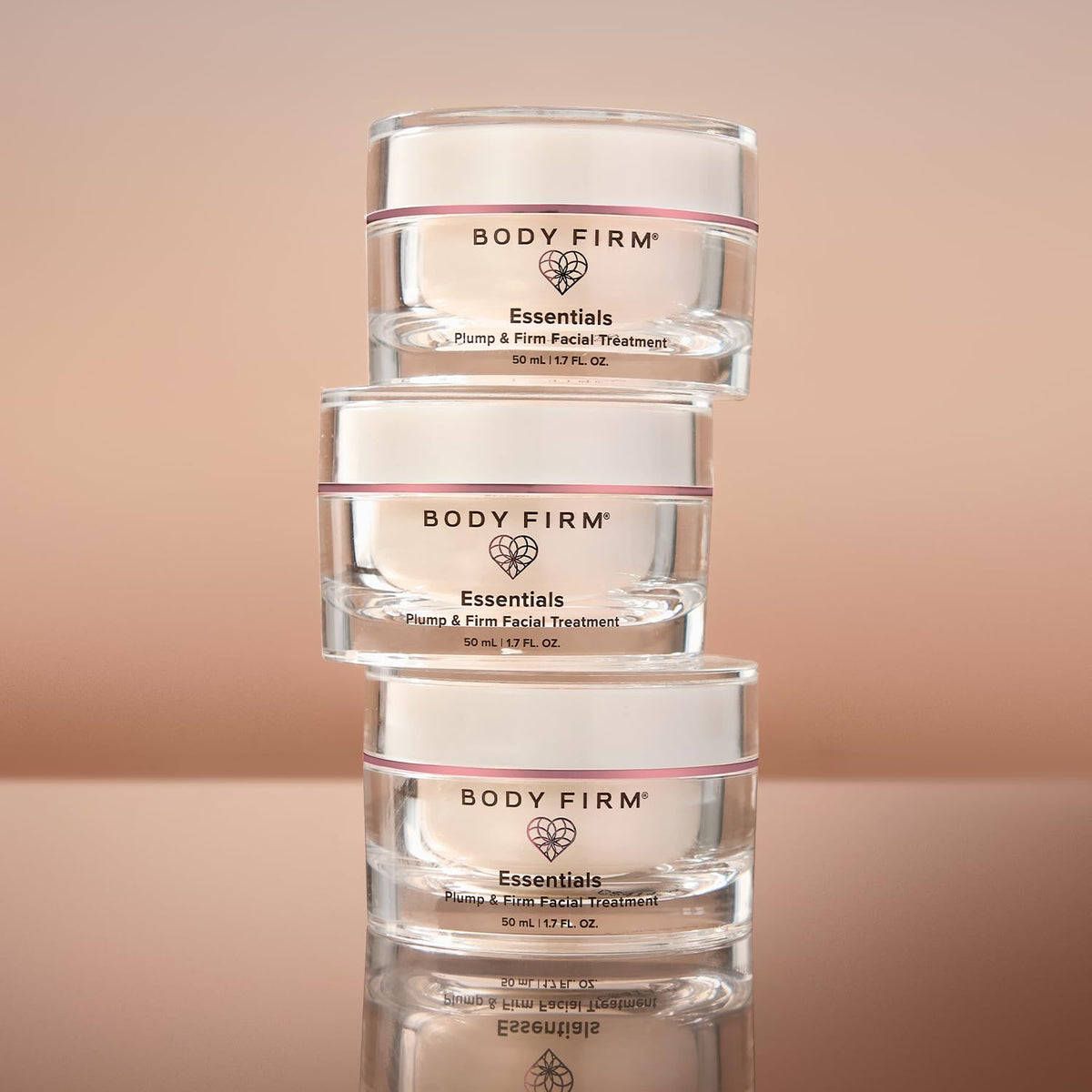BODY FIRM applying cream to jawline for visible smoothing benefit