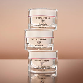 BODY FIRM applying cream to jawline for visible smoothing benefit