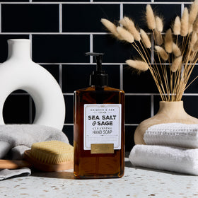 Body Prescriptions Crimson & Oak lather in hand showing rich foam and effective cleansing benefit
