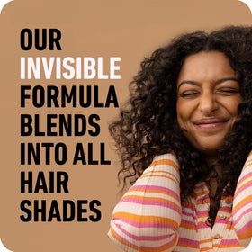 Boldify spray mist dispersing from can showing fine invisible coverage and convenience