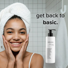 Person using Boldly Basic body wash in shower illustrating mild cleansing