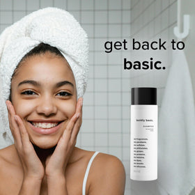 Person dispensing Boldly Basic shampoo into hand demonstrating mild use